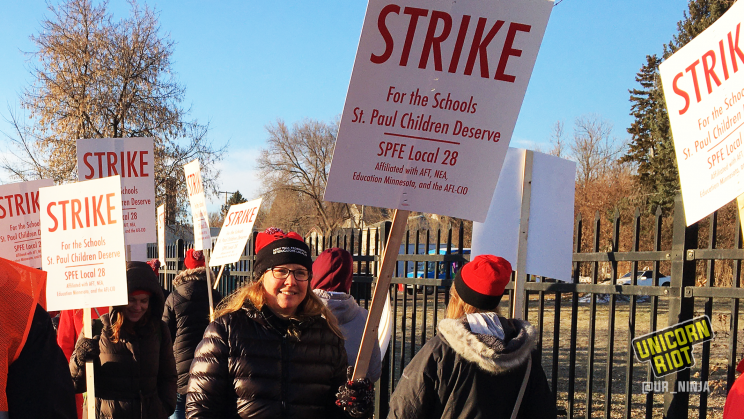 Saint Paul, Minnesota Educators Union on strike the morning of March 10 outside Washington Technology Magnet School in Minnesota. They are holding signs that say "STRIKE for the schools St. Paul children deserve, SPFE Local 28"