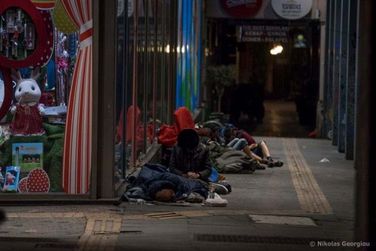 The unhoused sleep on a street in Athens, Greece