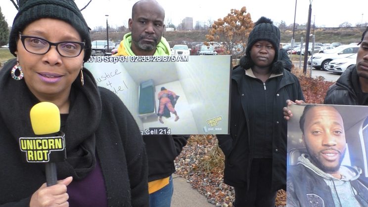 Del Shea Perry speaks in front of MN-DOC