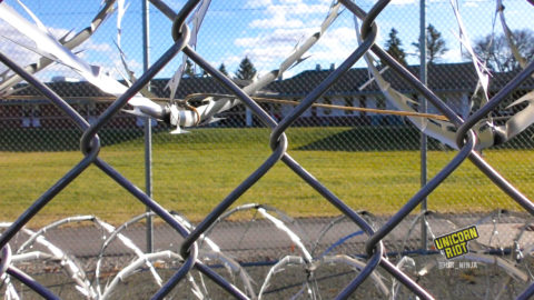 Barbed wire fence surrounds Faribault prison in MN
