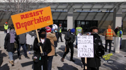 rally at ICE building calling for an end to the war on immigrants