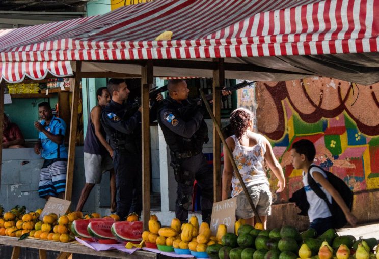 Militarization of the favela's daily life - photo via Fabio Bento