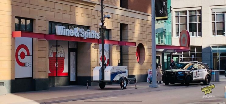 An MPD squad car and a police mobile surveillance command post monitoring Nicollet Mall outside Target’s flagship downtown Minneapolis store / Photo contributed by Marjaan Sirdar