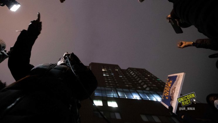 February 8, 2022, Minneapolis, Minnesota, USA: Speakers address a crowd of hundreds of protesters outside of the Bolero Flats Apartments where on February 2, 22 year old Amir Locke was killed by Officer Mark Hanneman of the Minneapolis Police.