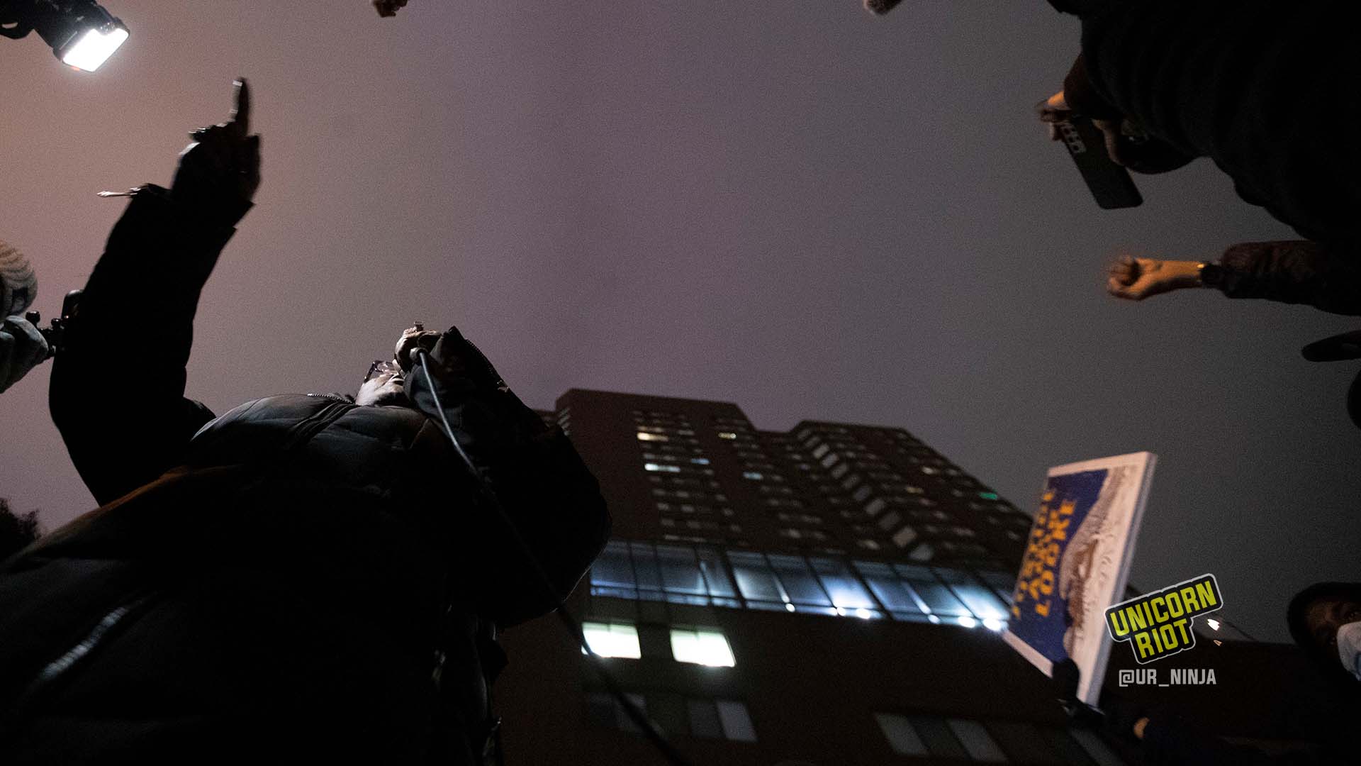 February 8, 2022, Minneapolis, Minnesota, USA: Speakers address a crowd of hundreds of protesters outside of the Bolero Flats Apartments where on February 2, 22 year old Amir Locke was killed by Officer Mark Hanneman of the Minneapolis Police.