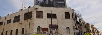 large billboard of shireen abu akleh in jenin city during her funeral. she was a journalist shot by israeli forces on may 11, 2022.