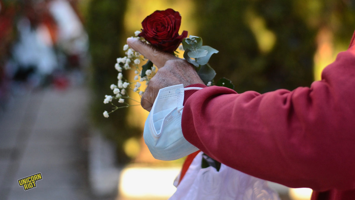 Theodoros Tellidis, 89, points his finger in the air during the Nov. 17, 2022, demonstration against the former ruling military junta.