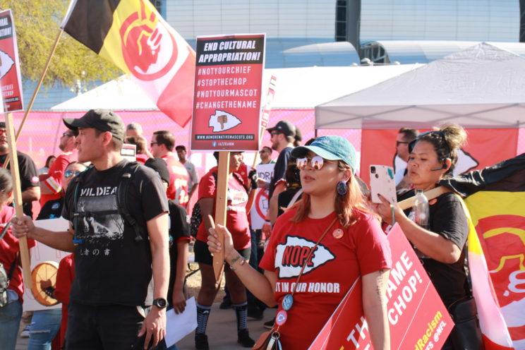 Protestors outside Super Bowl LVII demonstrated that Kansas City drop its team name "Chiefs" on Sunday, February 12, 2023. Photo taken by Darren Thompson.