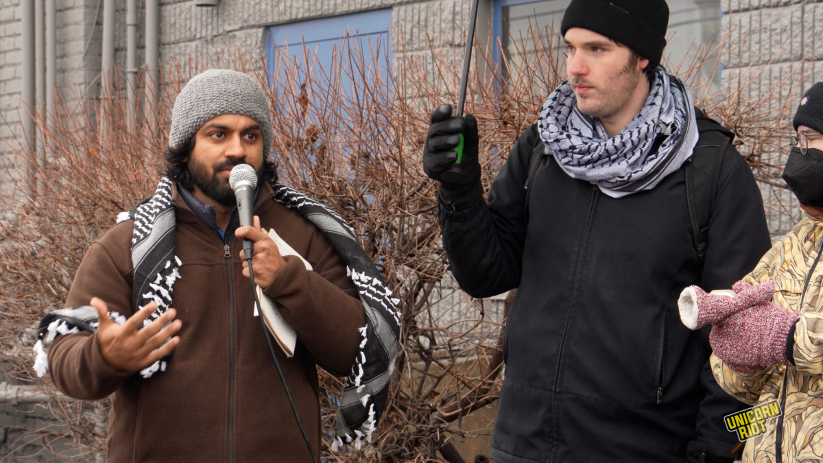 Nazir  Khan (left) speaking at the protest against Smith Foundry