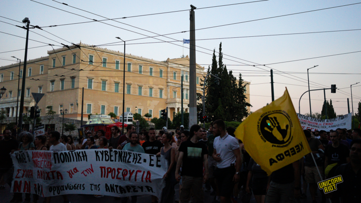 The demonstration commemorating one year since the shipwreck of Pylos passing by in front of the Greek Parliament, in Athens.