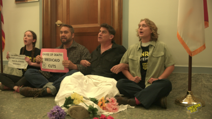 Sunrise activists perform action outside of senator's office