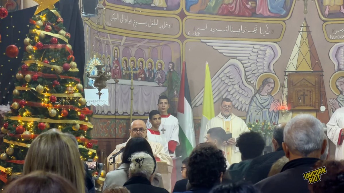 Palestinian Christians Light Christmas Tree at Gaza City’s Holy Family Church